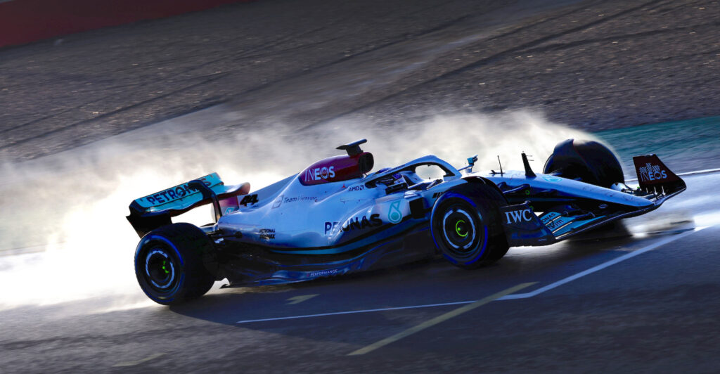 Mercedes car on the track with maximised performance.