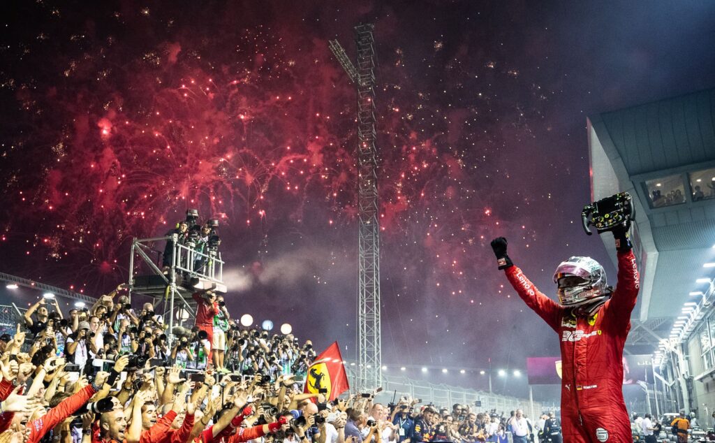 Sebastian Vettel celebrating after race with the Ferrari team.